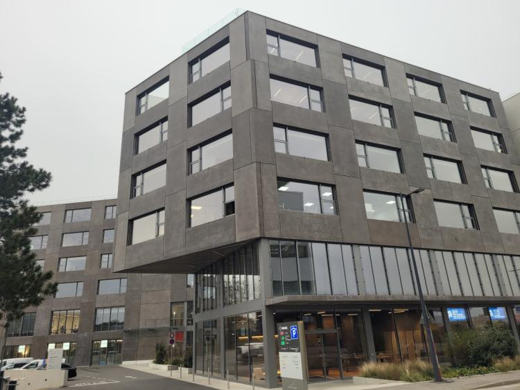 15 indoor parking spaces on the first basement level and 3 on the second basement level